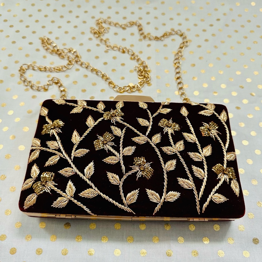 Maroon velvet clutch